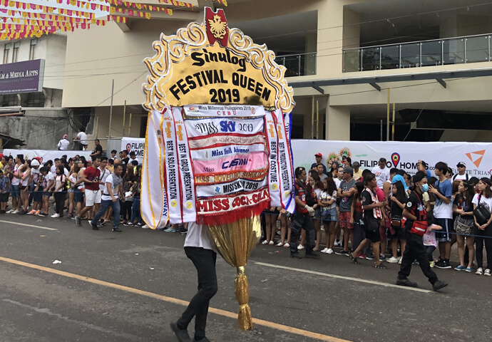 There are streets used for the grand parade, so the people in the area who want to witness the grand activity are regulated to ensure safety for both parties. If you get lucky to stand in a spot where you can easily see up close the activity, you will definitely enjoy the moment. 