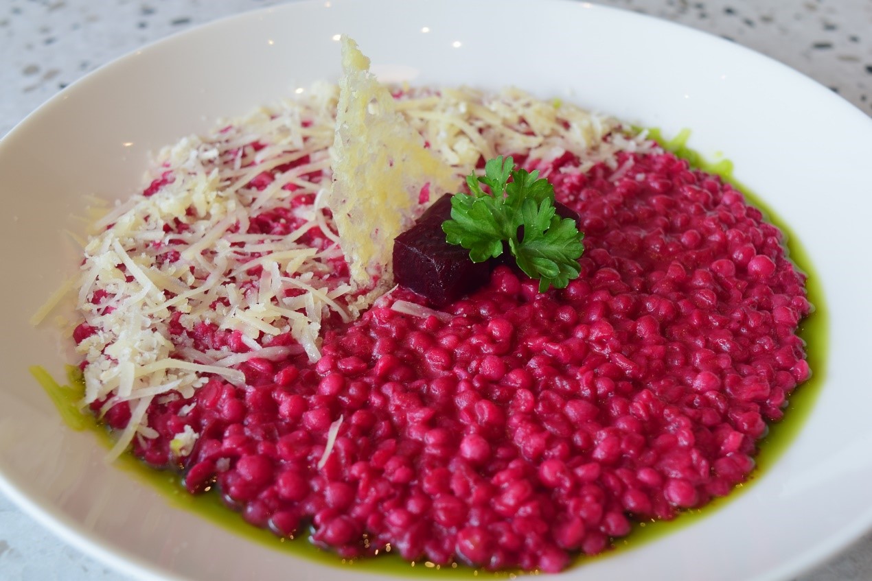 A healthy dish made up of adlai rice, roasted beetroot, basil oil, topped with parmesan crisp
Beetroot Risotto (P440)