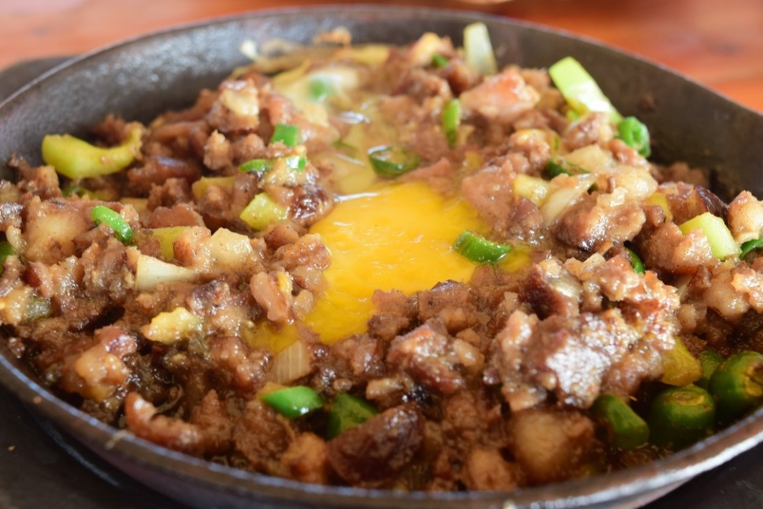 Sisig (P195)

Sisig is another Filipino comfort dish that’s composed mainly of pig’s parts such as face and ears. It is usually seasoned with calamansi, onions and chili peppers. It originates from the island of Luzon but Lantaw’s Cebuano version of it is a must-try!