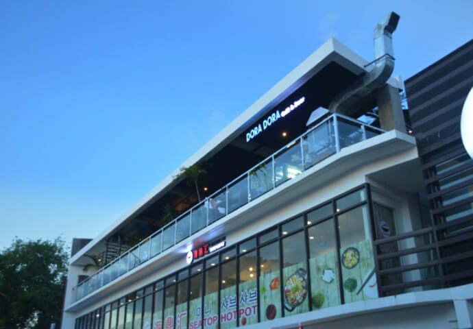 It is located inside the Shang's Mall across from JPark Resort. 
You can find this building after passing the parking lot.
