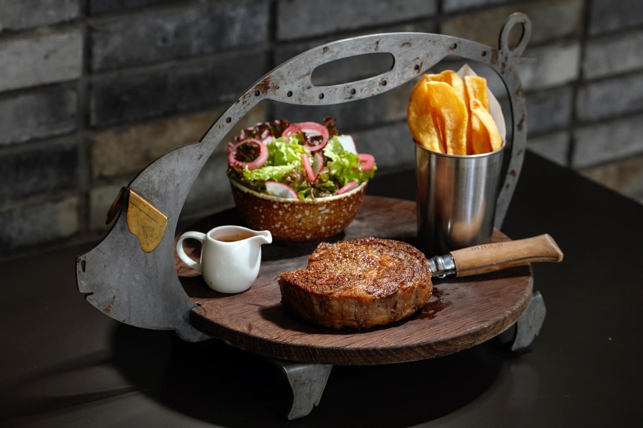 300g 35-day dry aged Hereford ribeye with chips and salad (P2700)