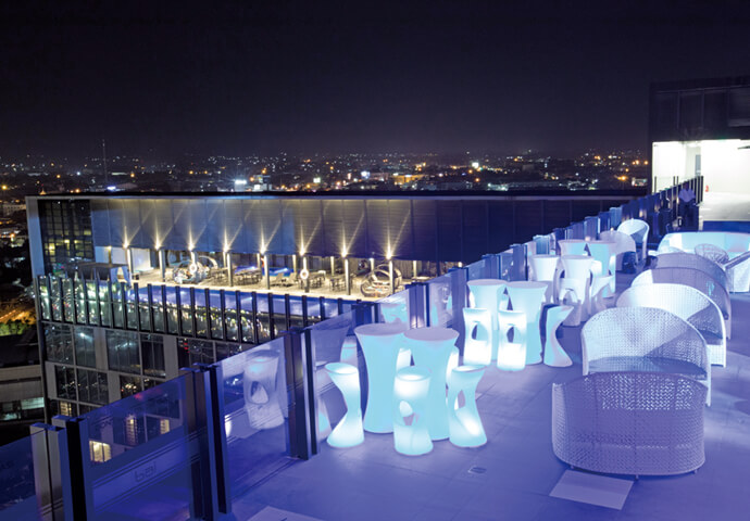 Take in a stunning panoramic night-time view of the city.