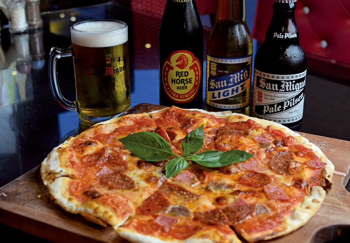 Crispy thin-crust pizza good with alcohol!
