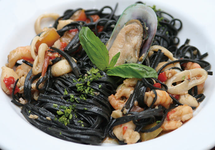 Squid ink pasta, shrimp, and pepperoncino